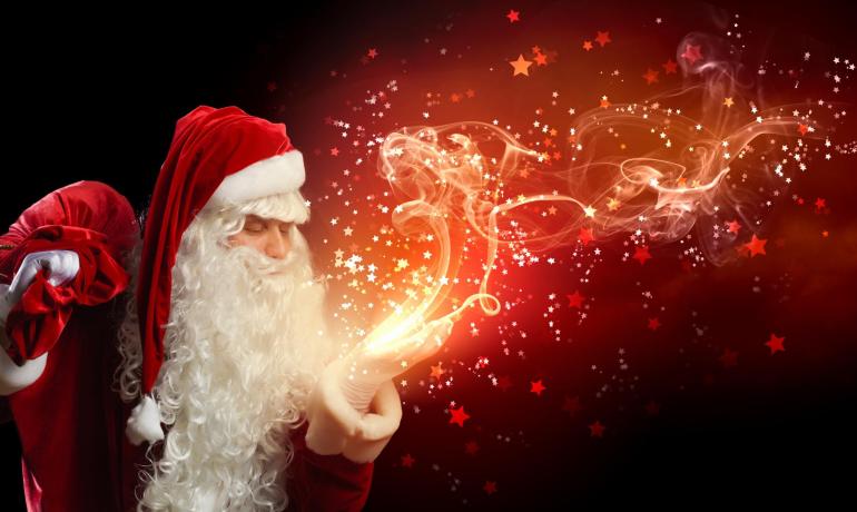 Santa Claus with magic and sparkling stars.
